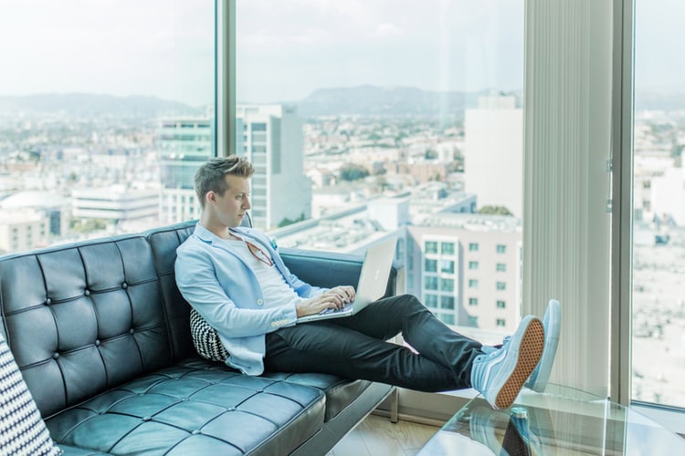 A person working remotely on their laptop.